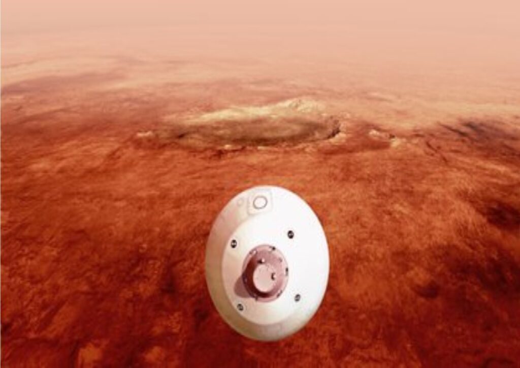 Fotografía de la NASA donde aparece una ilustración del "aeroshell" que contiene el rover Perseverance mientras hira pra para un aterrizaje seguro sobre la superficie de Marte.
